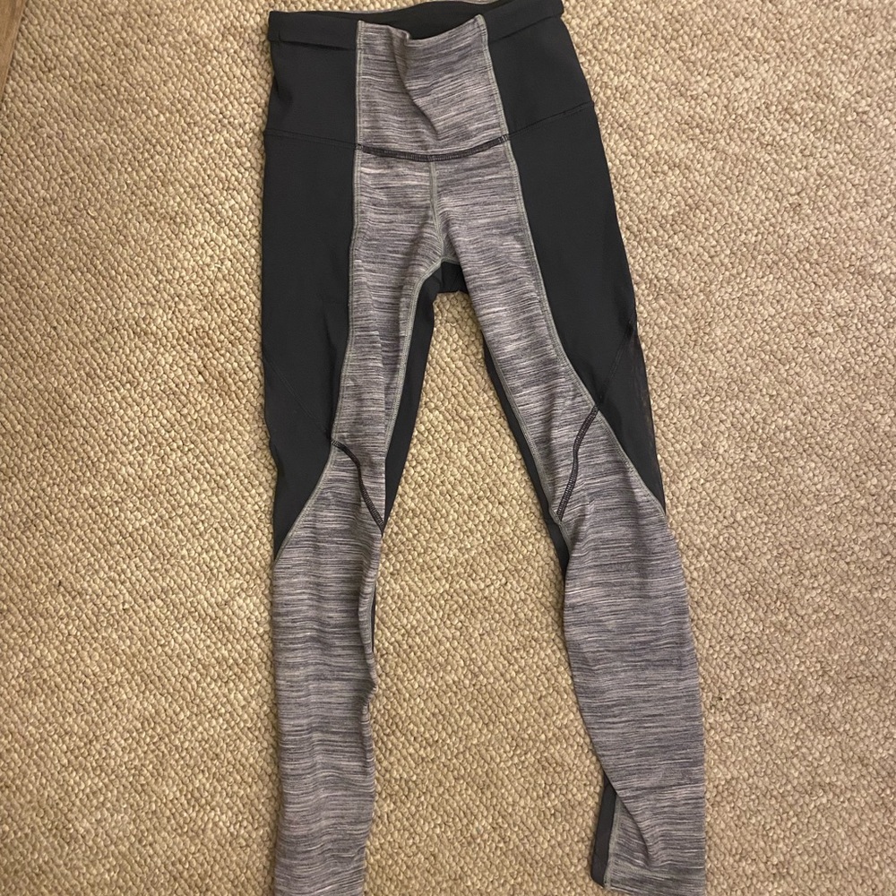 Lululemon black and heather grey leggings with zipper.